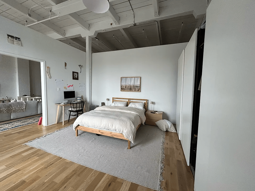 bedroom area with partial walls