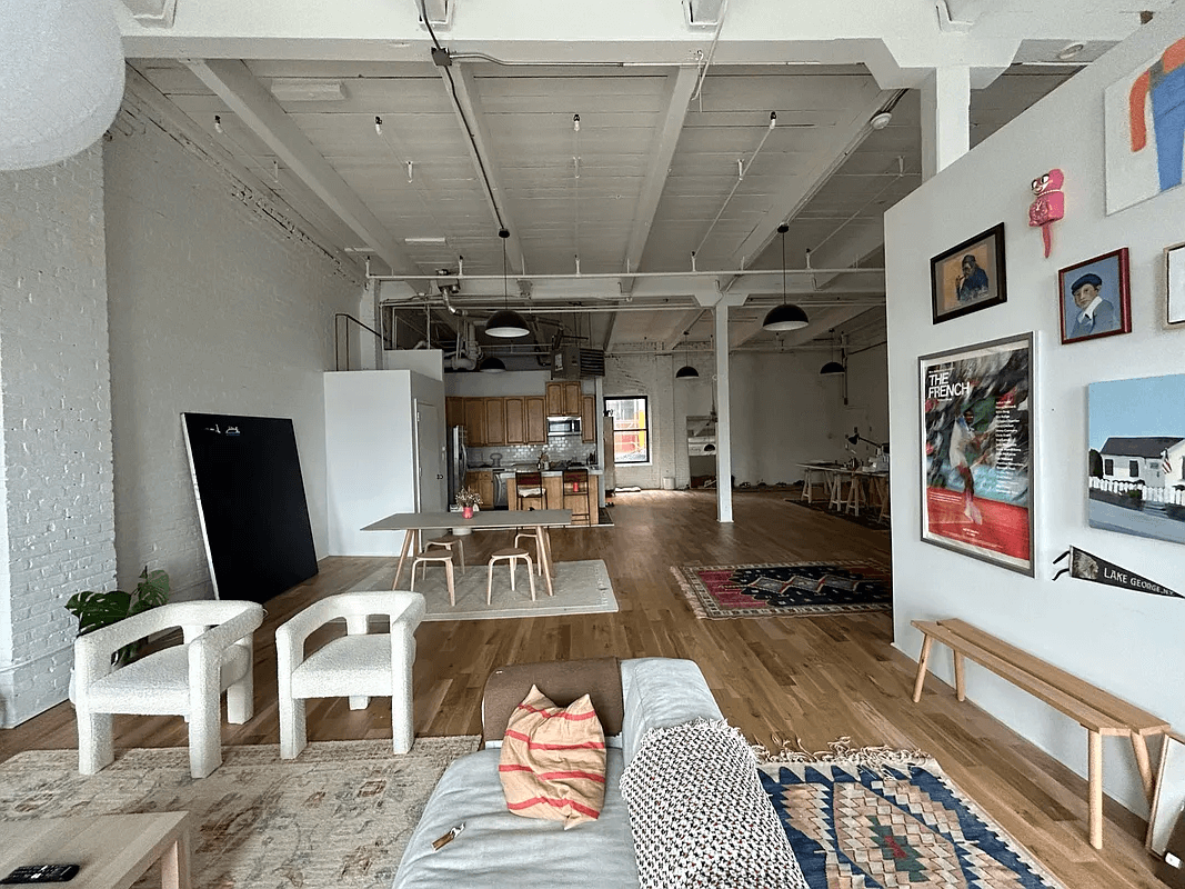 view toward kitchen in middle of loft