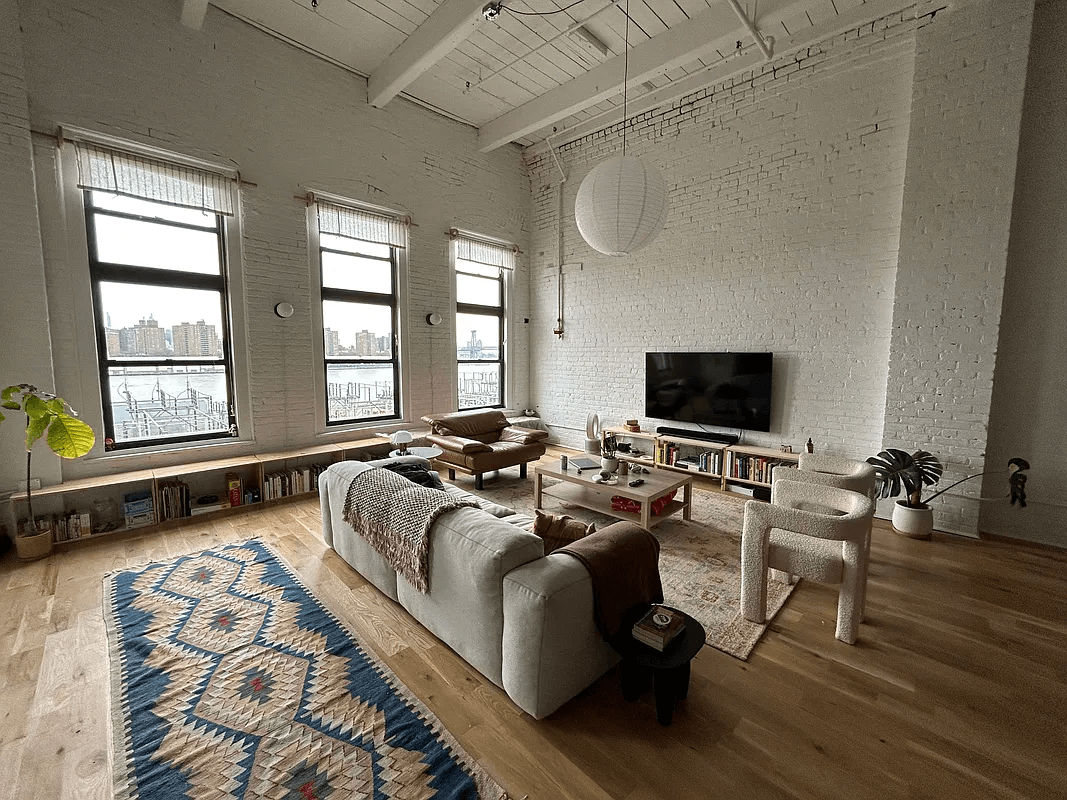 dumbo rental - interior of the loft with brick walls