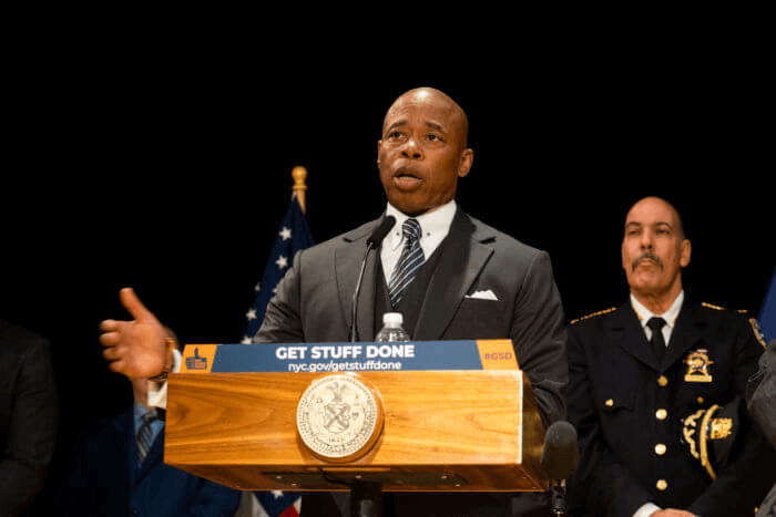 the mayor at a podium