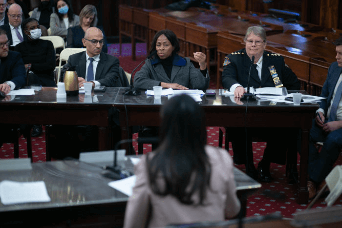 people at a hearing