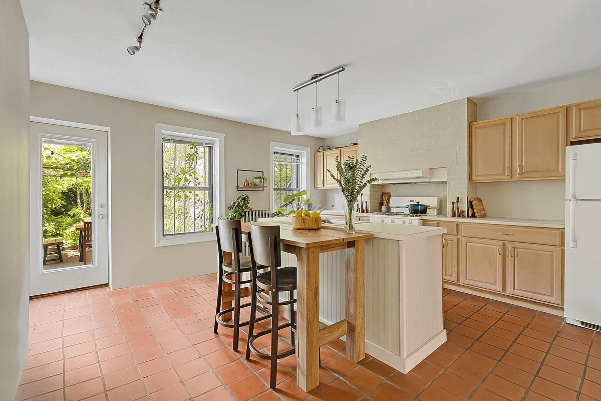 kitchen with terra cotta tile floor on garden level