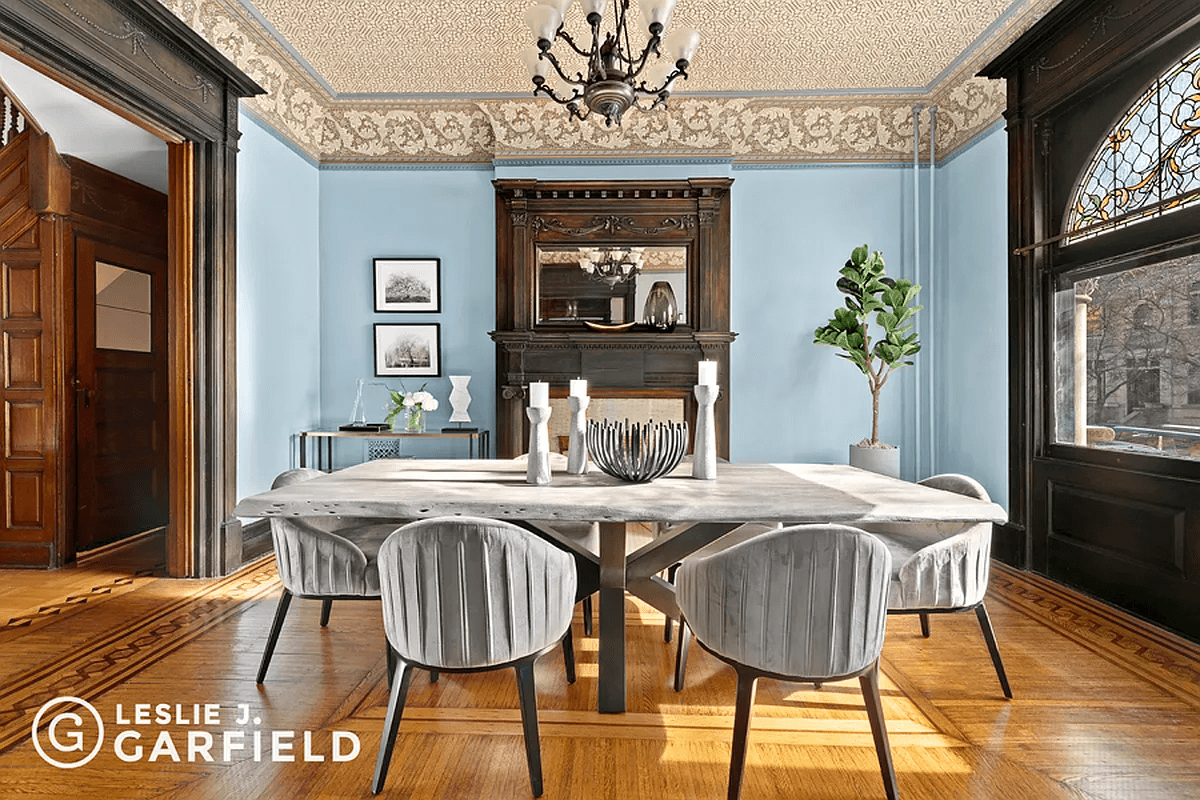 dining room with stained glass and mantel