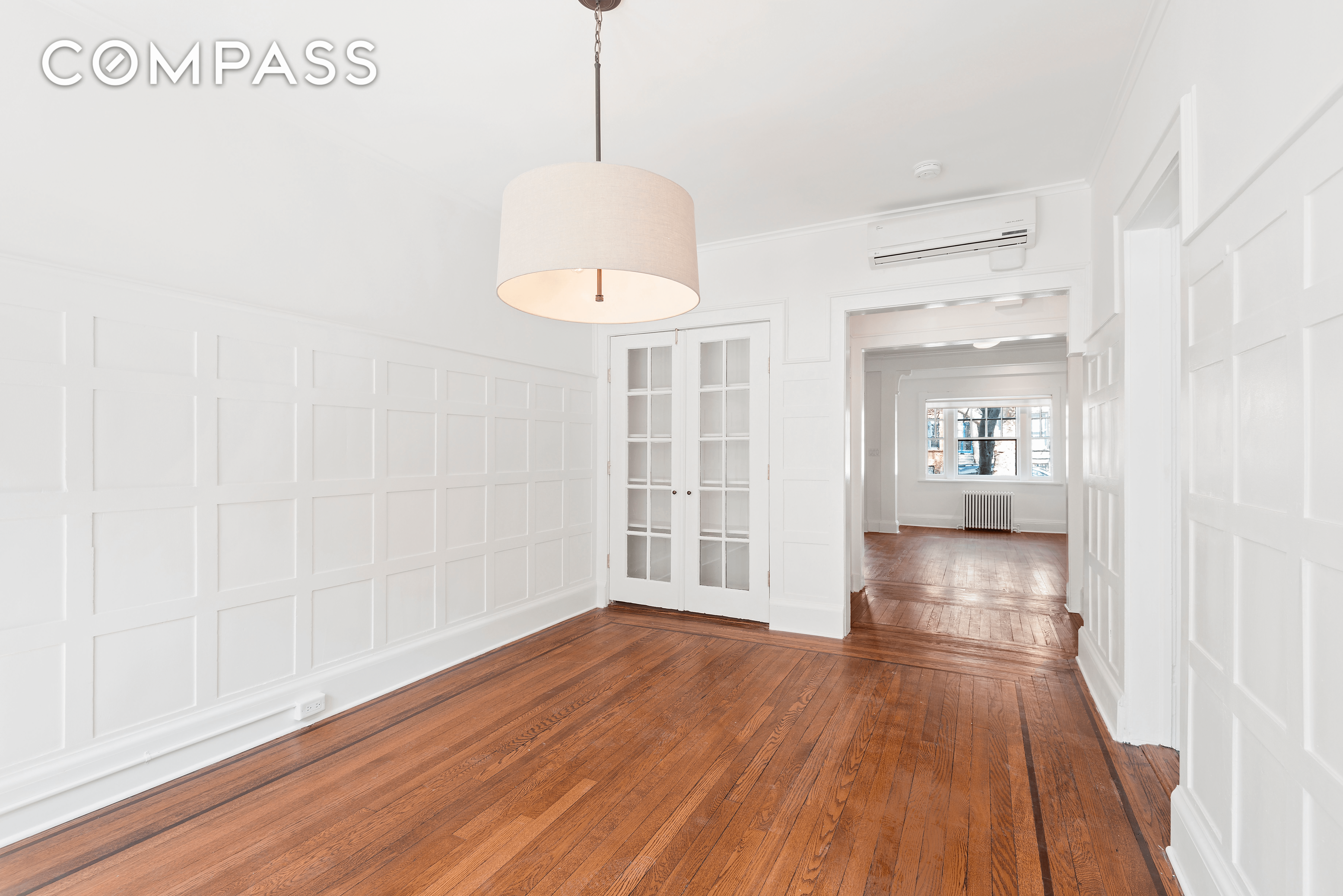 dining room with wainscoting