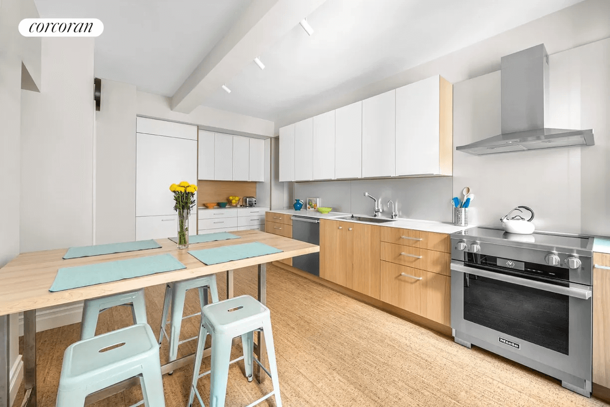 kitchen with wood lower and white upper cabinets