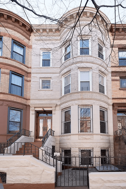 exterior of the brick, bow fronted row house