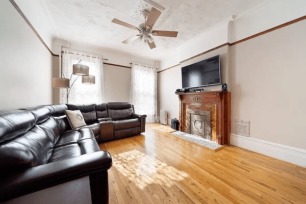 living room with wood mantel