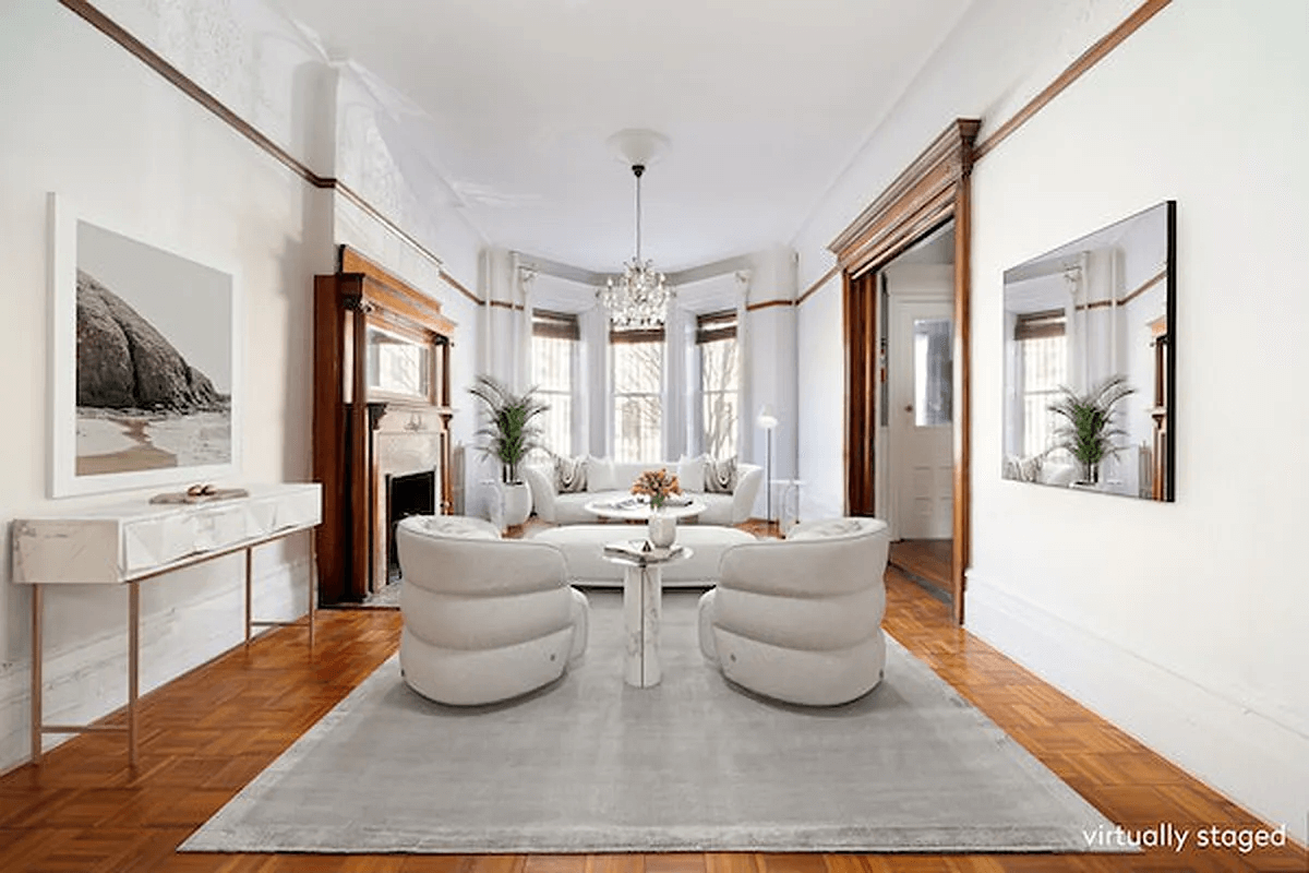 staged parlor with parquet floor and moldings