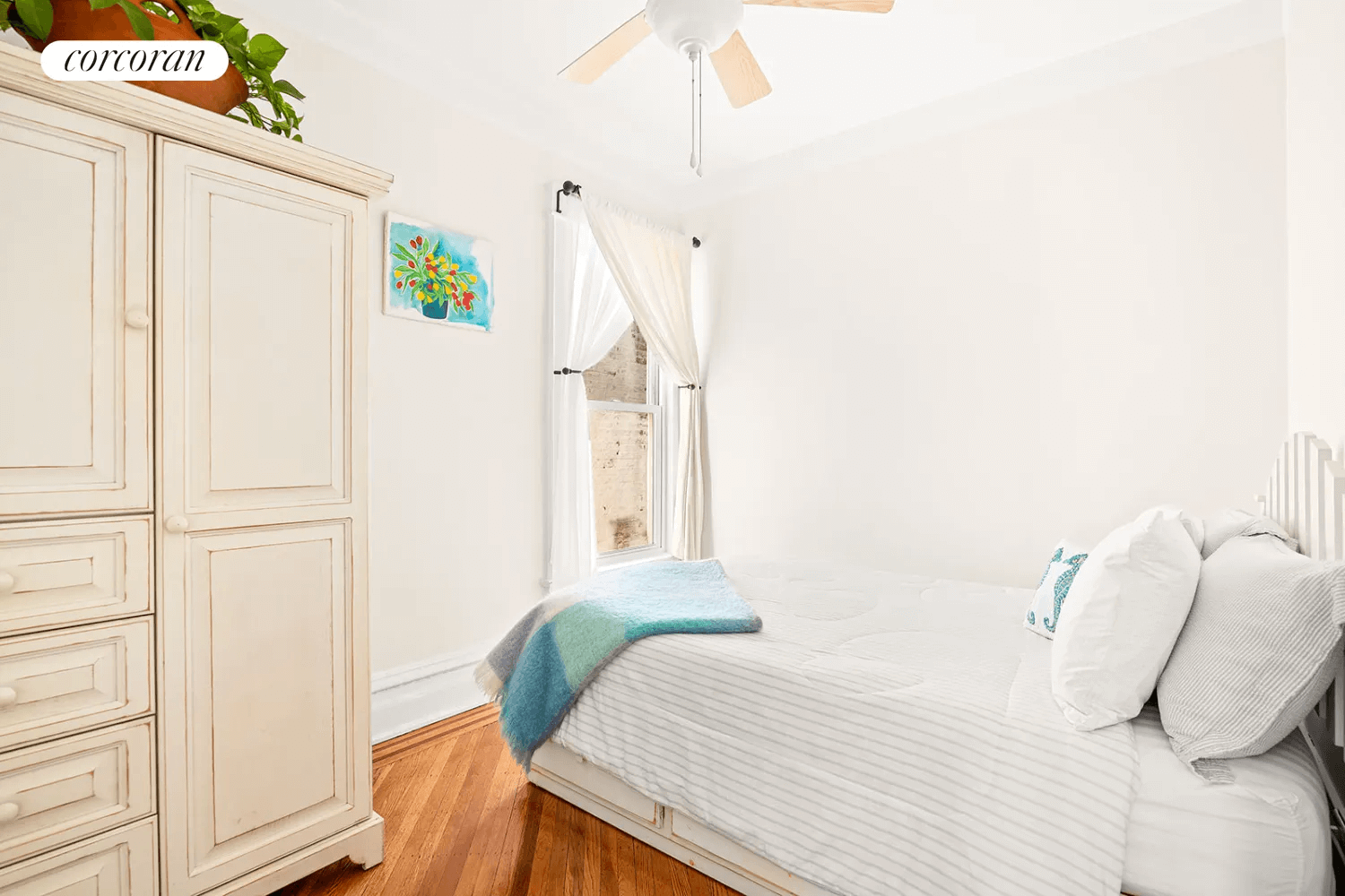 bedroom with wood floors