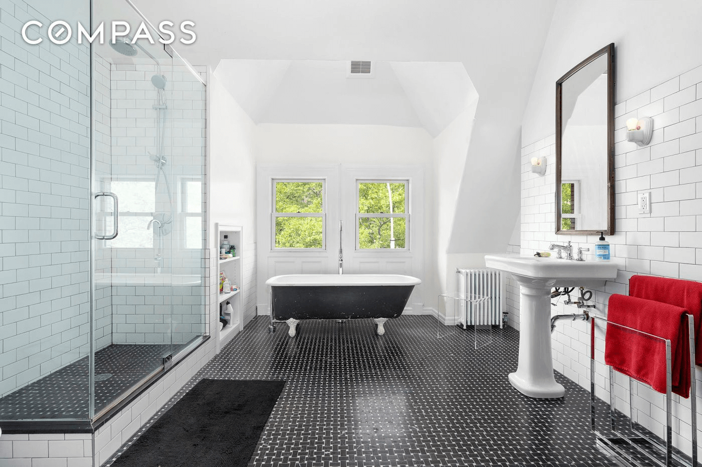 bathroom with black and white floor tile