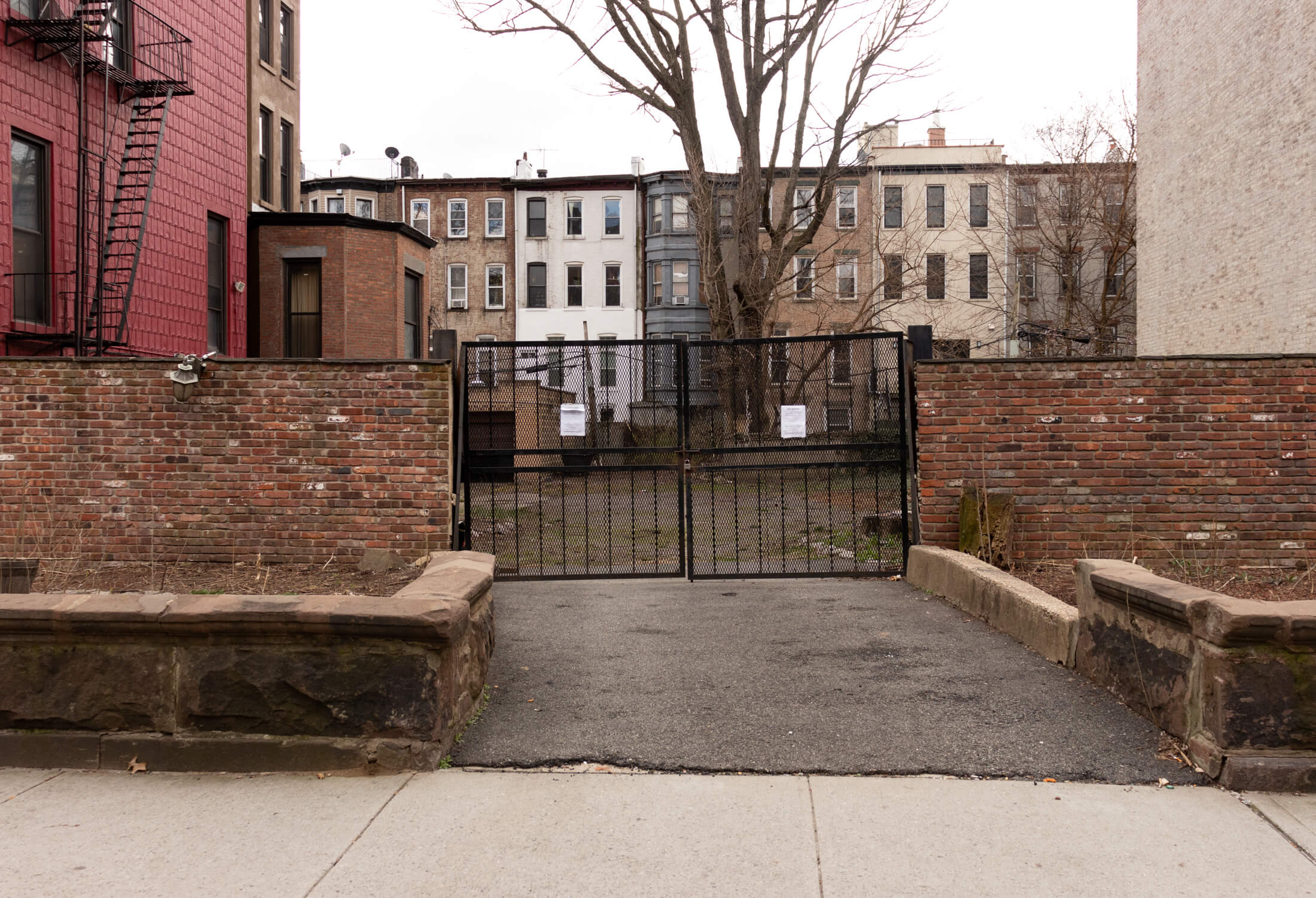 gates in front of the vacant lot