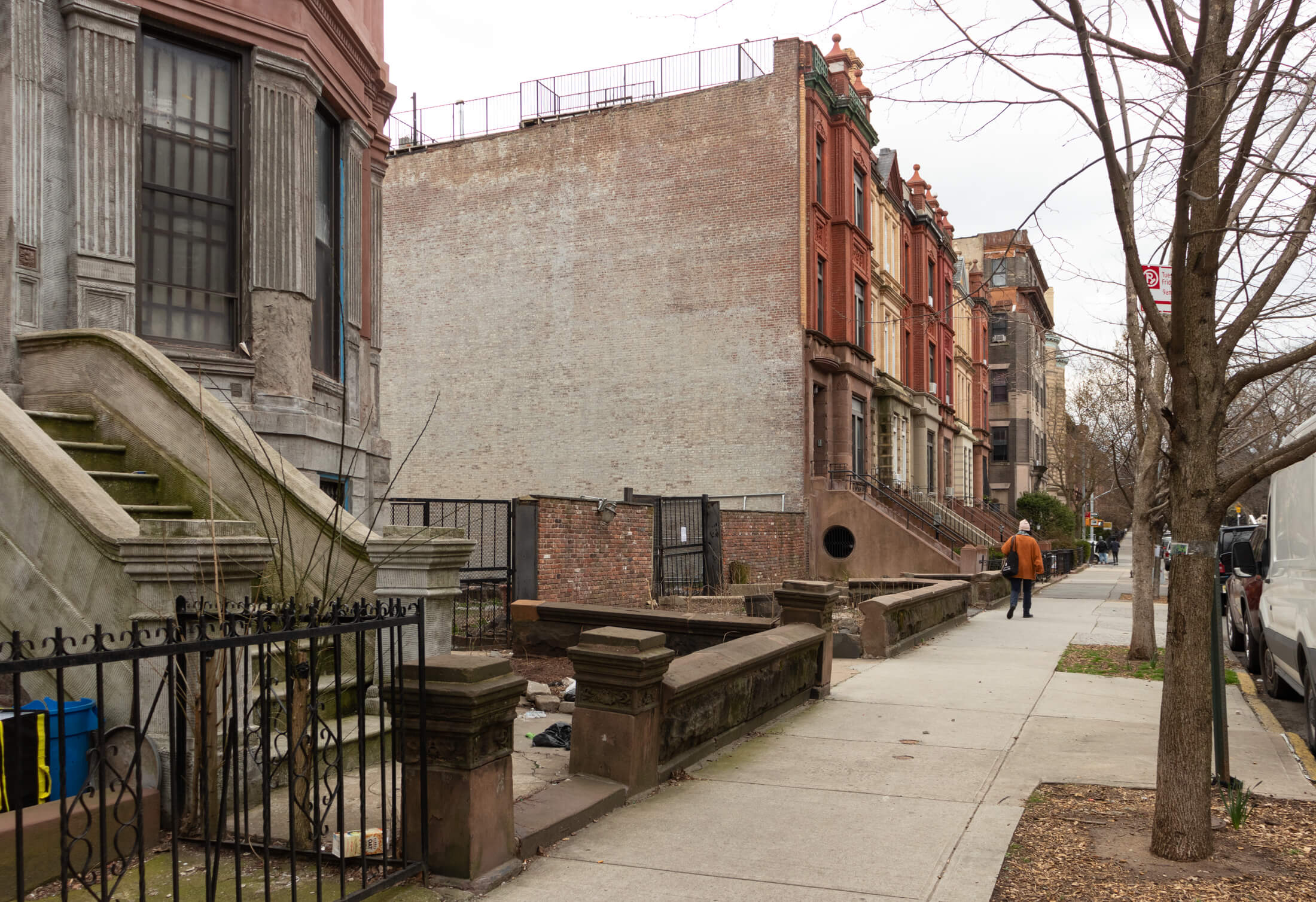 view on hancock street showing vacant lot and adjacent houses