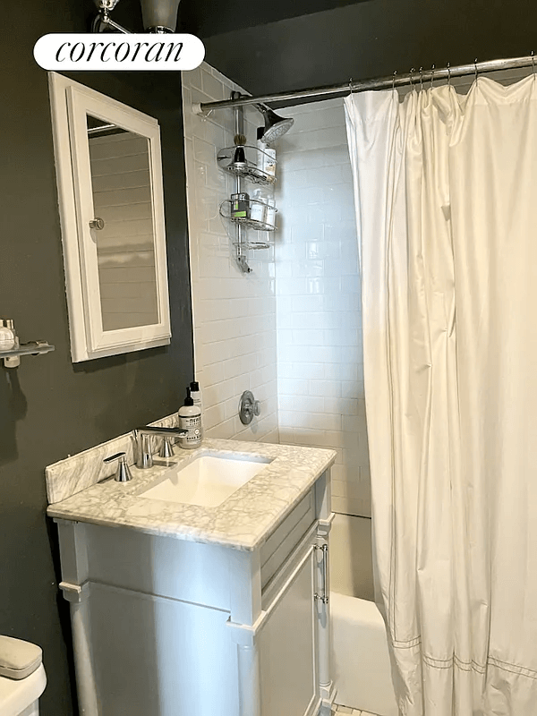 bathroom with white subway tile