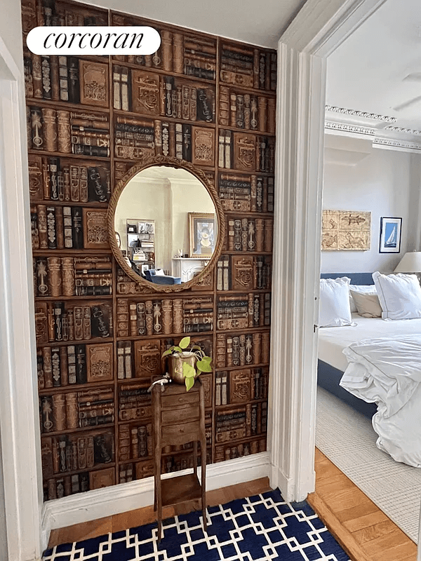 hallway with book wallpaper
