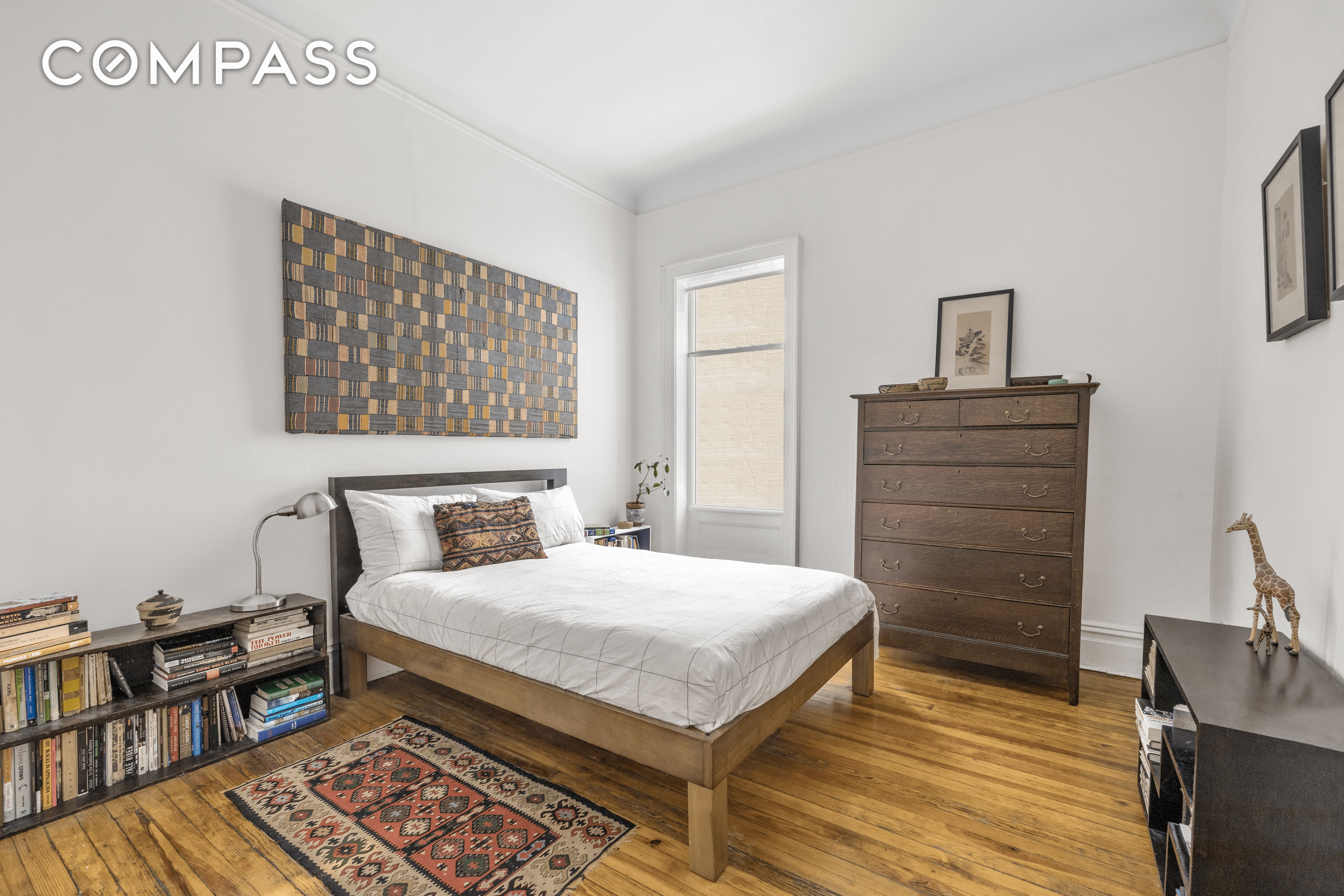 bedroom with wood floors