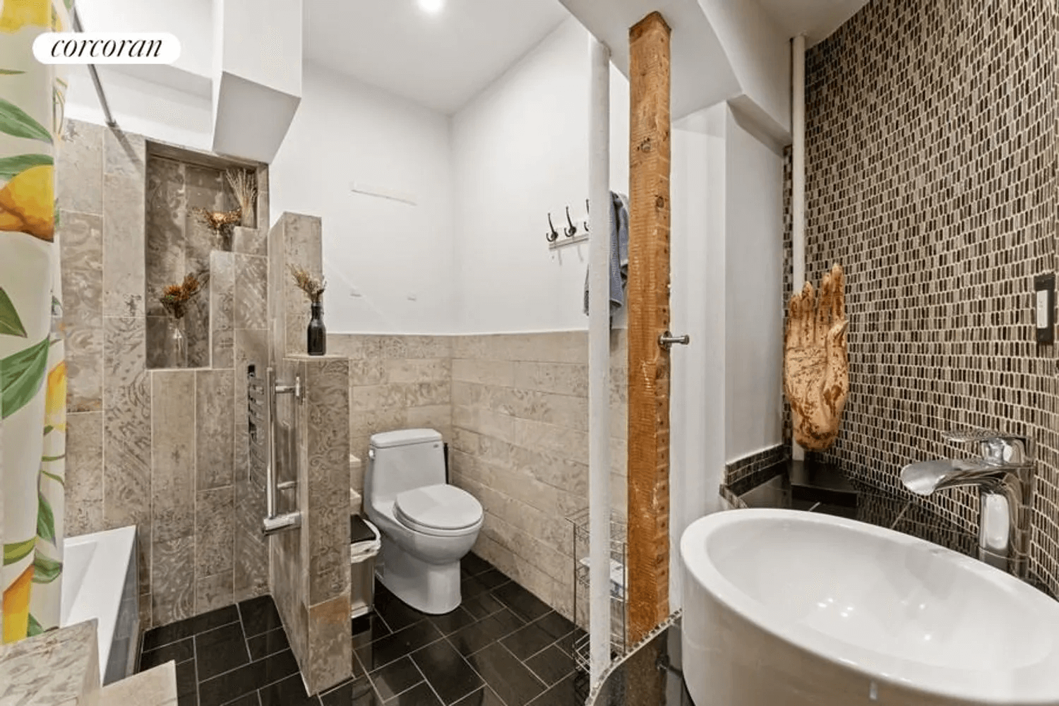 bathroom with brown tile