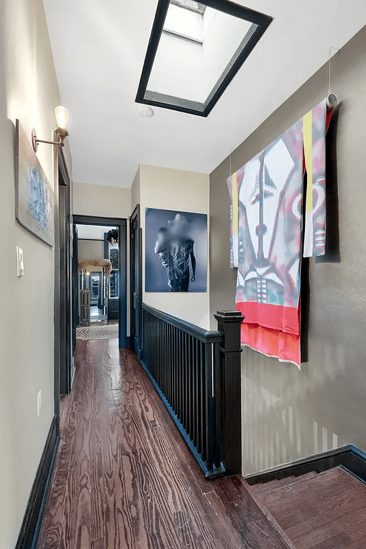 upstairs hallway with skylight