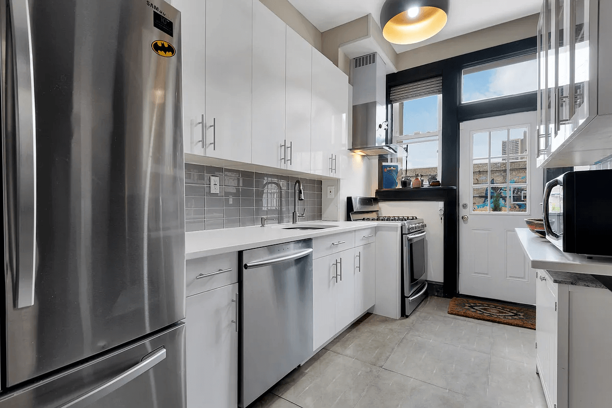 kitchen with white cabinets