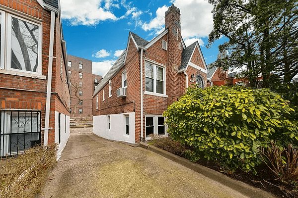 exterior of brick house with driveway