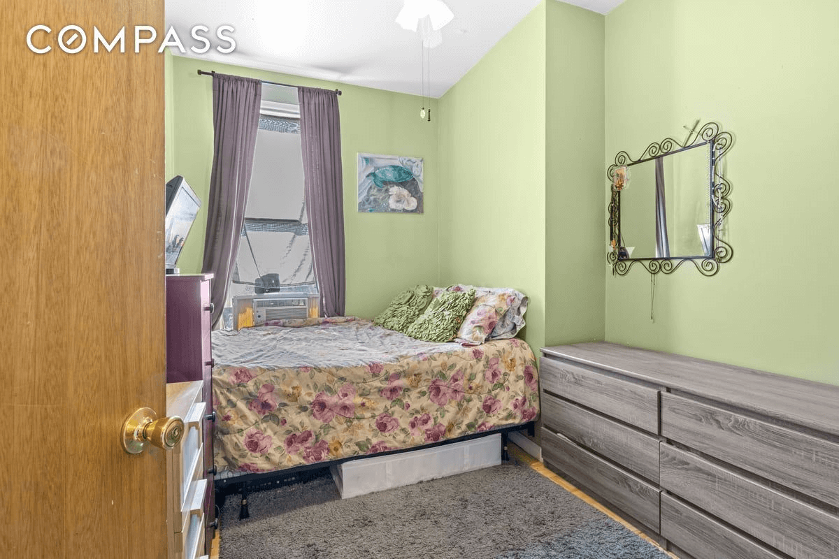 bedroom with wood floors