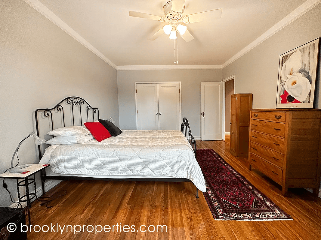 bedroom with wood floors