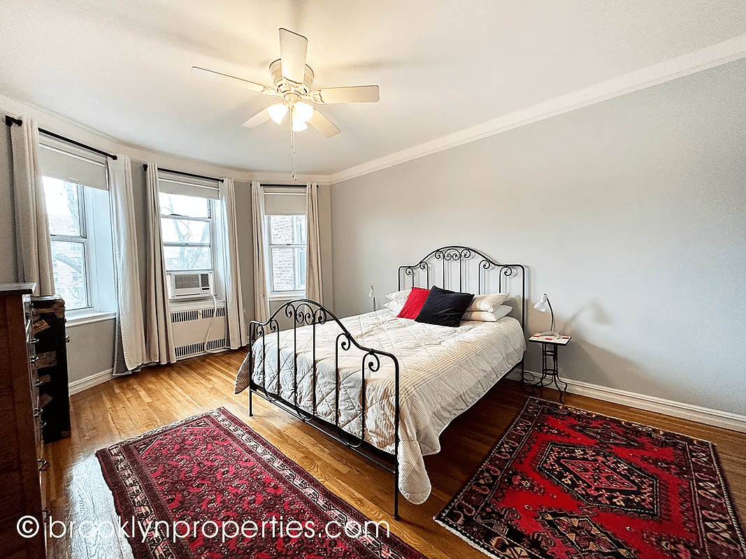 bedroom with wood floors