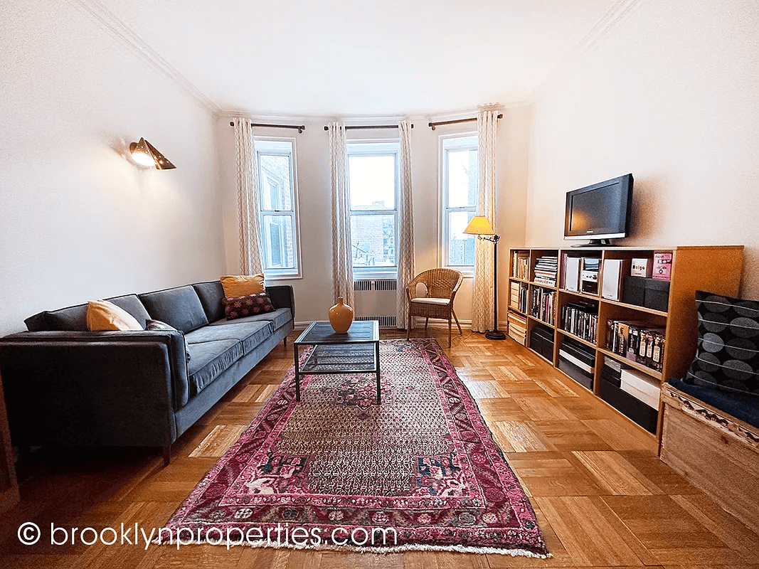 living room with three windows