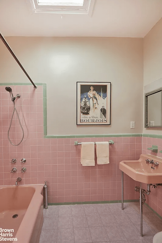 bathroom with pink fixtures