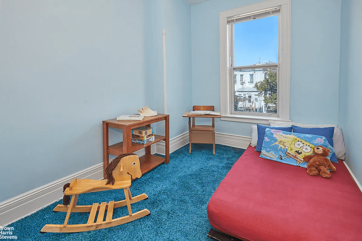 bedroom with blue carpet