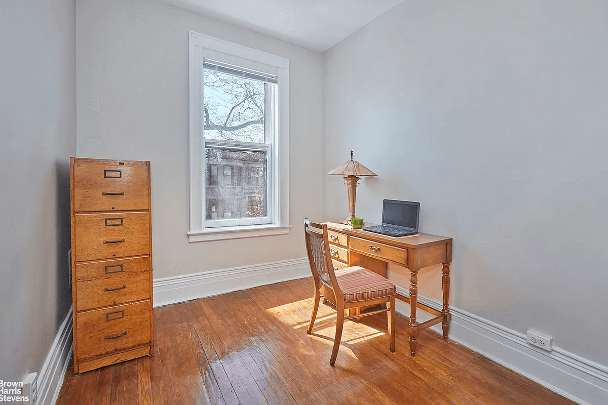 bedroom with wood floor