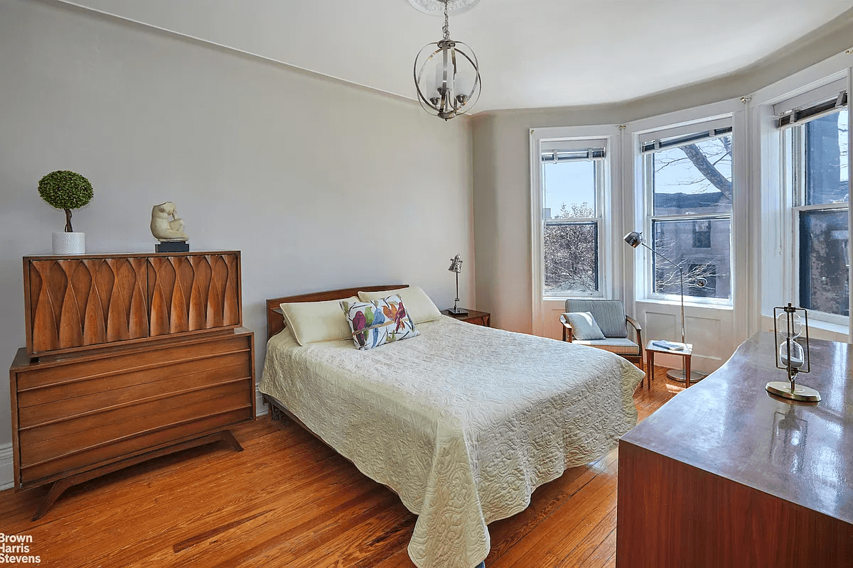 bedroom with wood floor