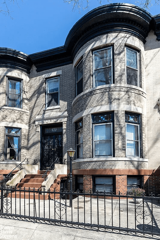 brick house with rounded bay