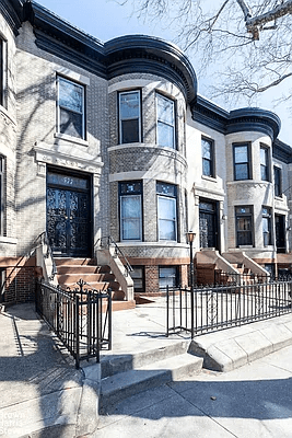 brick house with rounded bay