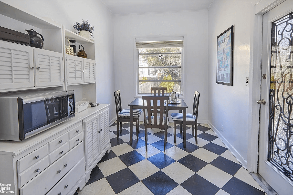 eating area with window in kitchen