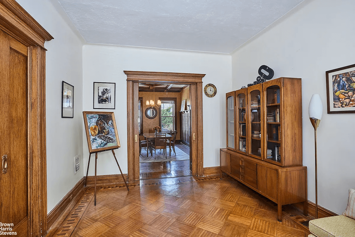 parlor with pocket doors to dining room