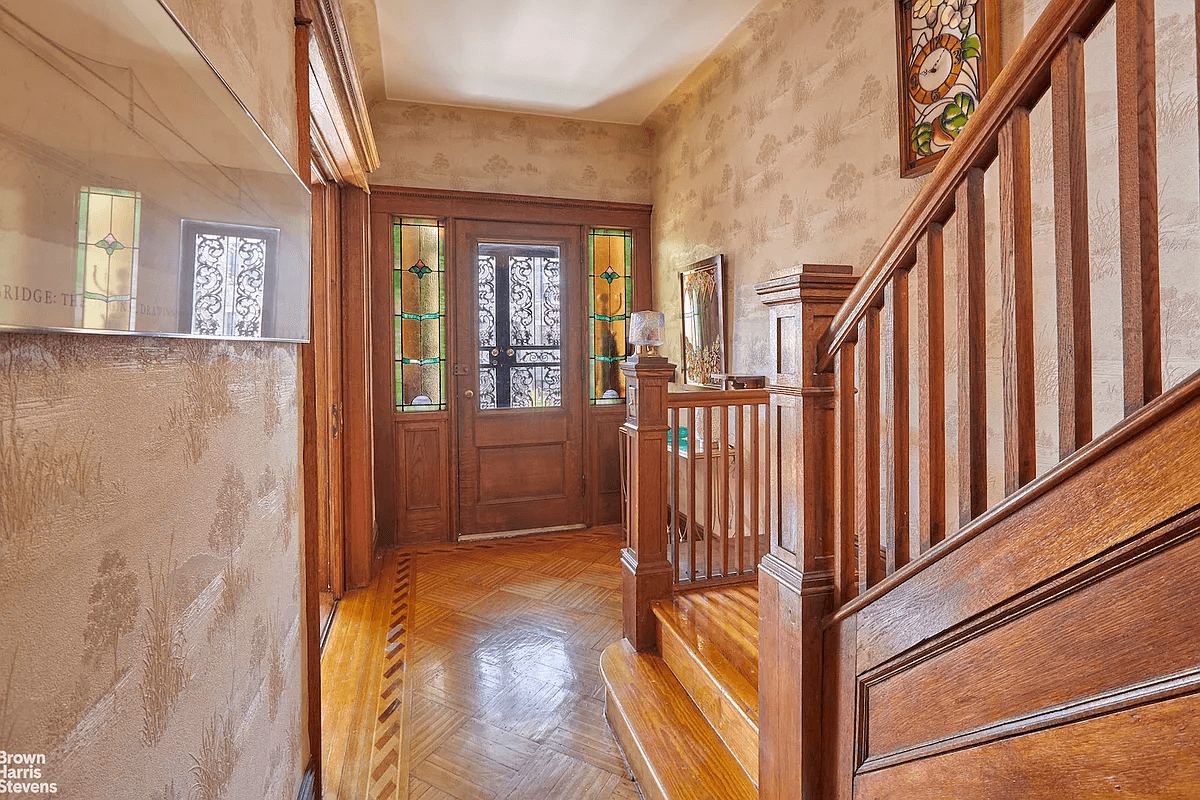 entry with stair and front door with stained glass