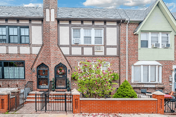 tudor revival brick house