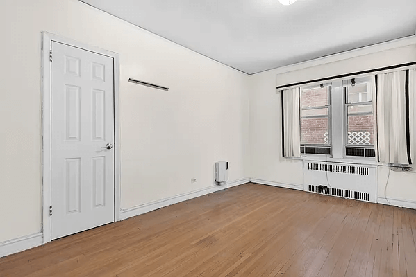 bedroom with wood floor