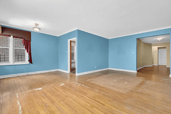 living room and dining area with wood floors