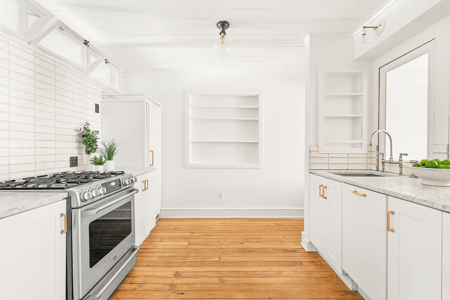 garden level kitchen with white cabinets