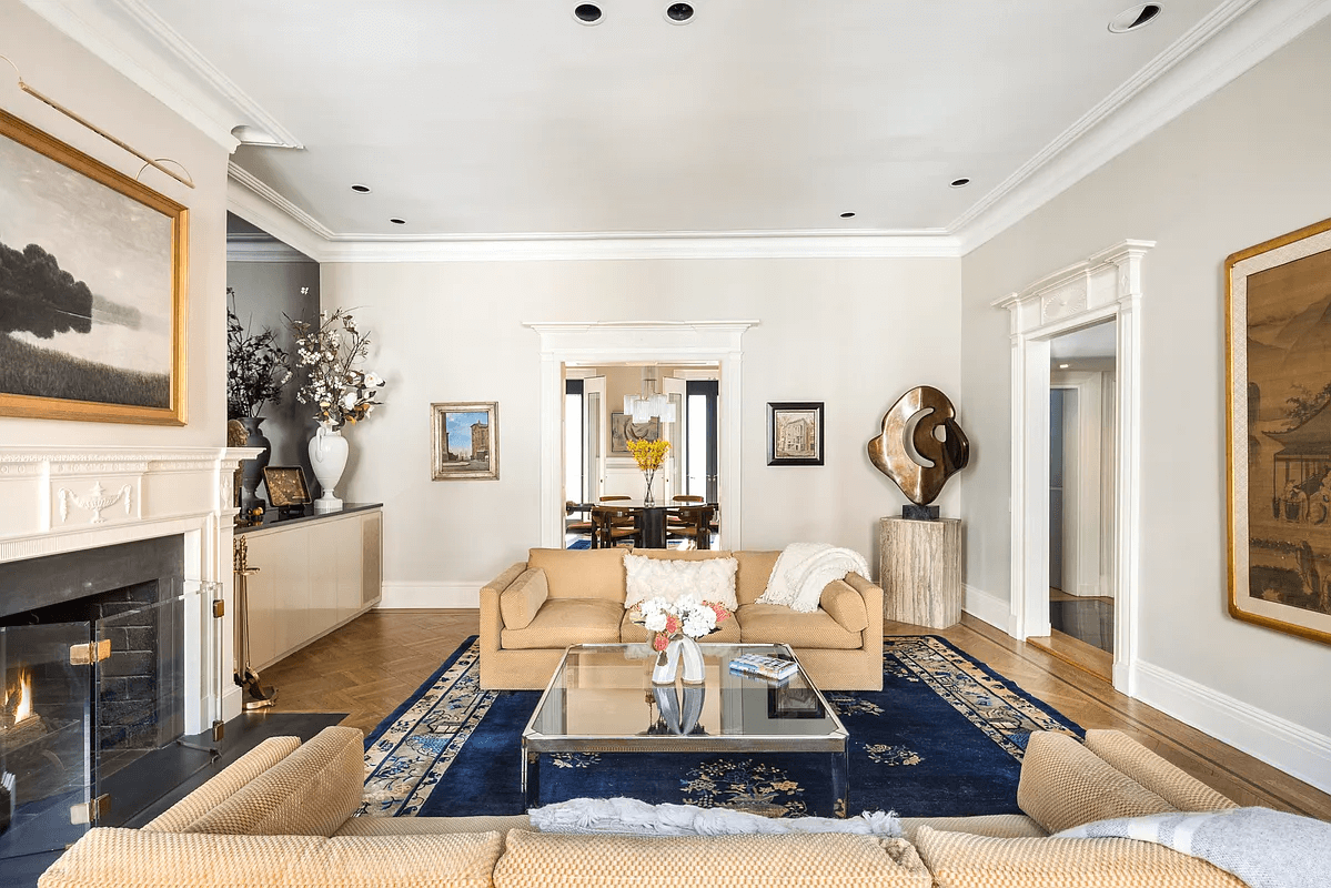 living room with wood burning fireplace