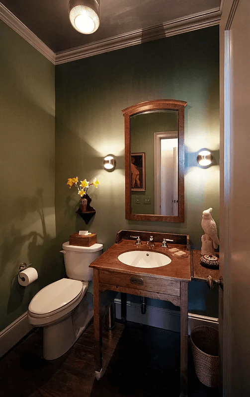 powder room with wood vanity