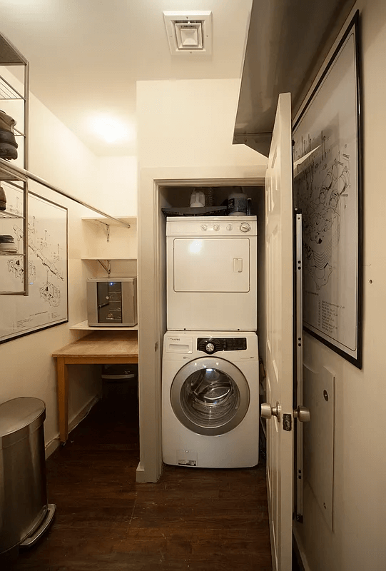 laundry with stacked washer/dryer