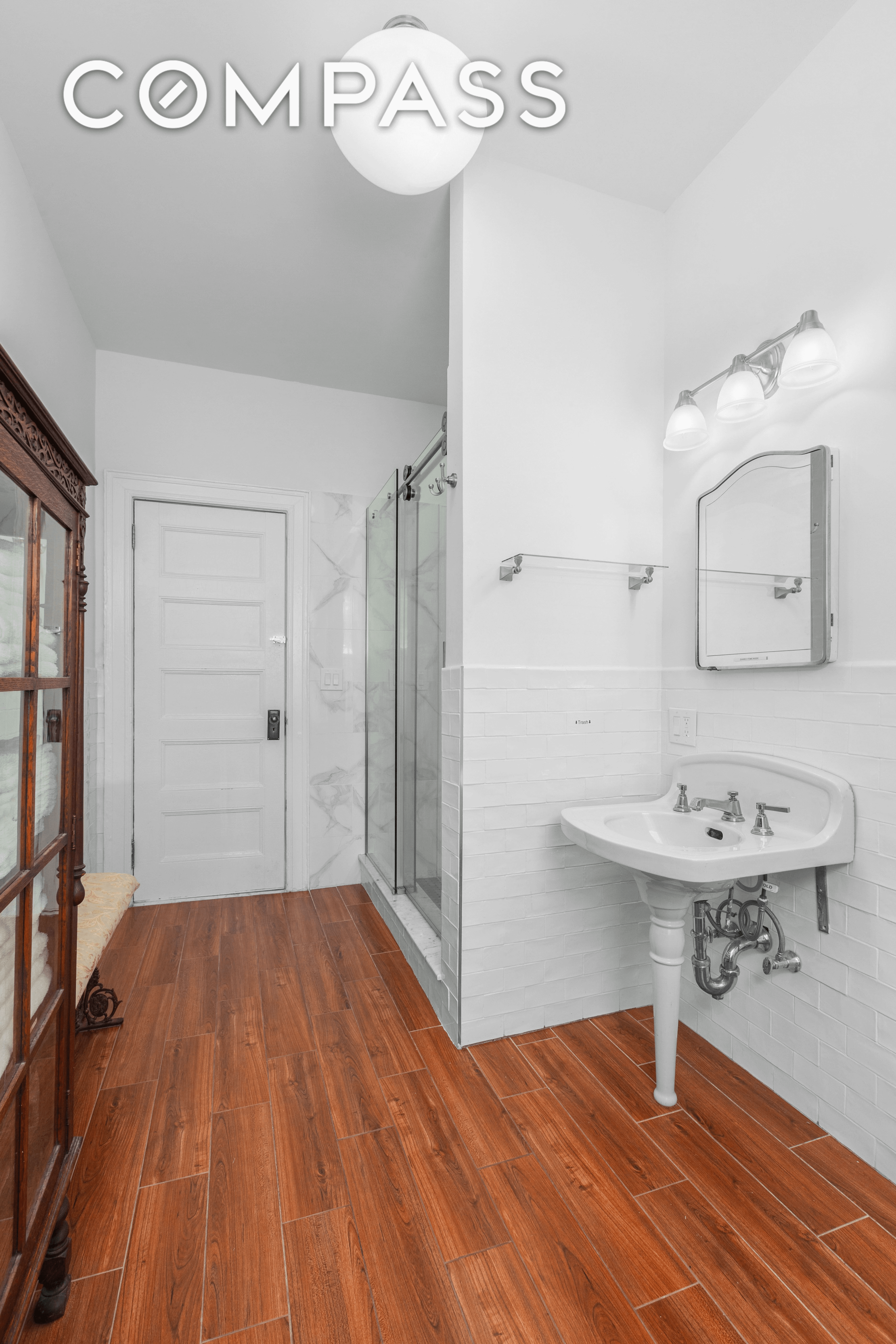 bathroom with faux wood tile floor