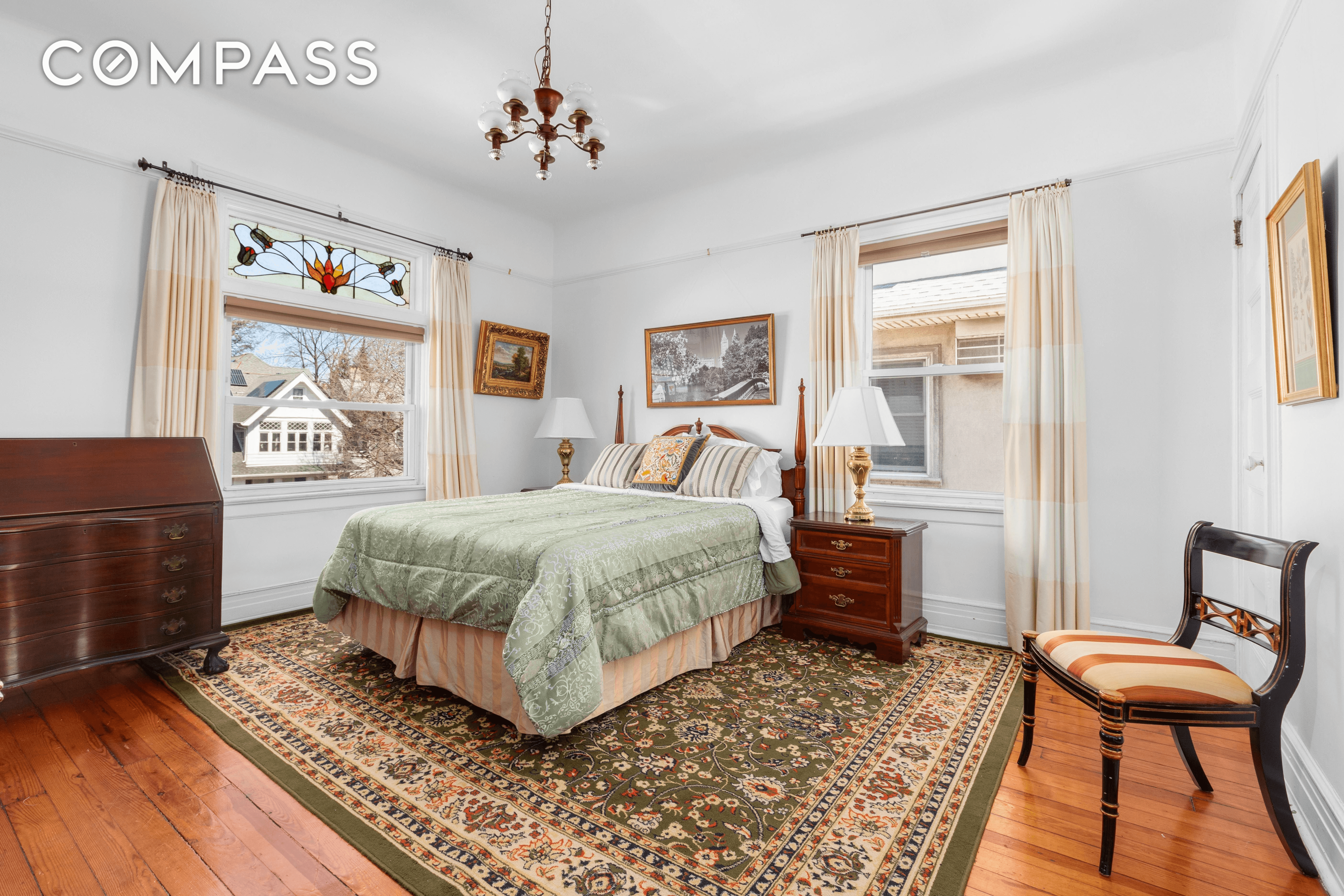 bedroom with stained glass window