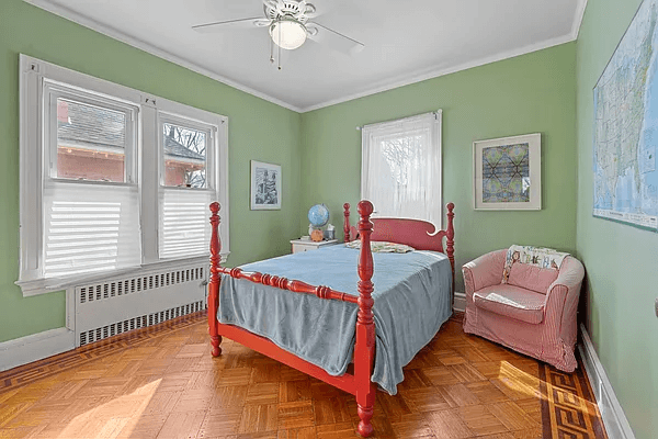 bedroom with wood floor with inlaid border