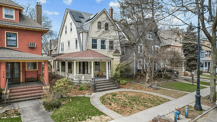 brooklyn house for sale exterior with view of solar panels and porch