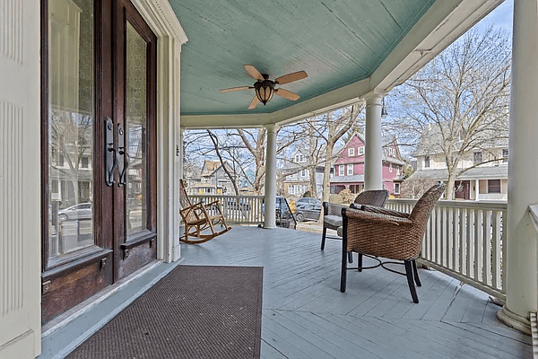 view of wood front doors