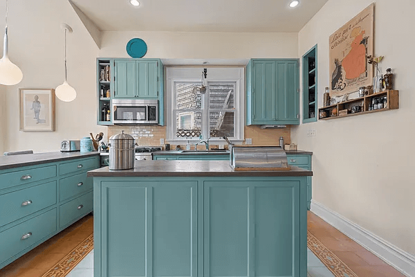 kitchen with blue cabinets and island