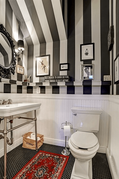 bathroom with black and white striped walls
